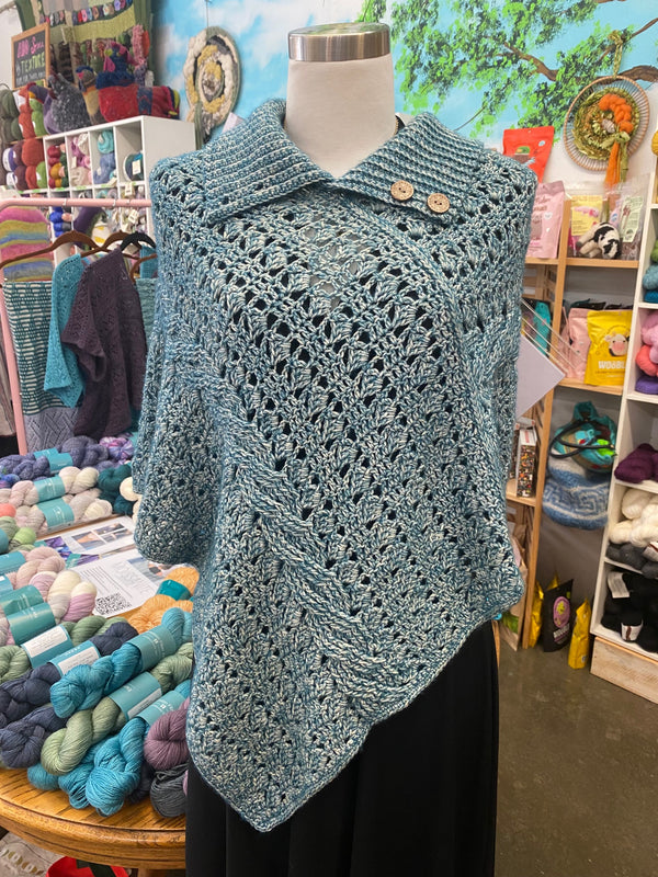 Learn How to Make a Cabled Crochet Poncho